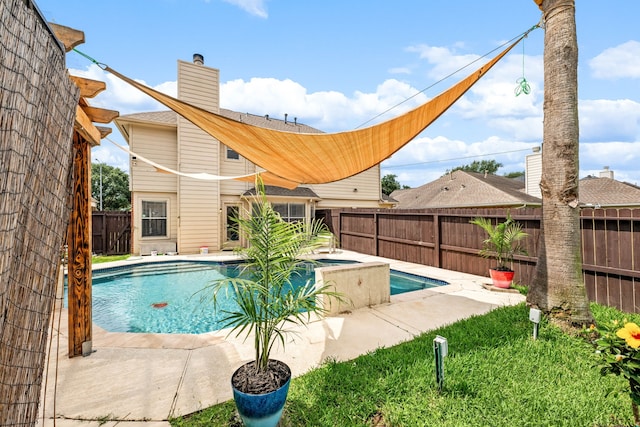 view of swimming pool featuring a fenced in pool and a fenced backyard