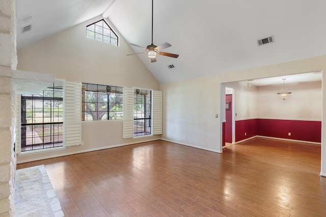 440 Saint Andrews St, Meadowlakes, TX 78654 - unfurnished living room featuring high vaulted ceiling, ceiling fan, hardwood / wood-style floors, baseboards, and beamed ceiling