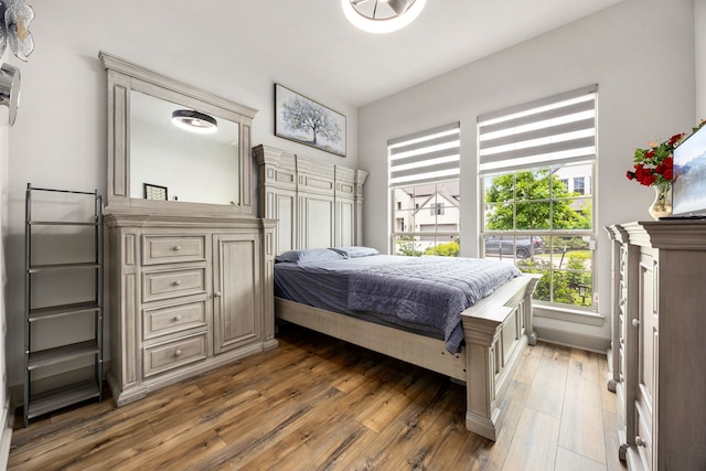 bedroom with light wood-type flooring