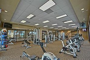 30106 Reagans Ranch Dr, Katy, TX 77494 - workout area with a drop ceiling