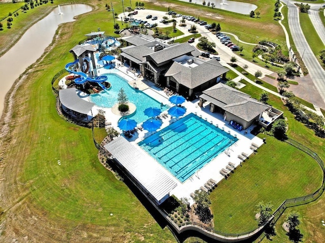 30106 Reagans Ranch Dr, Katy, TX 77494 - drone / aerial view with a water view