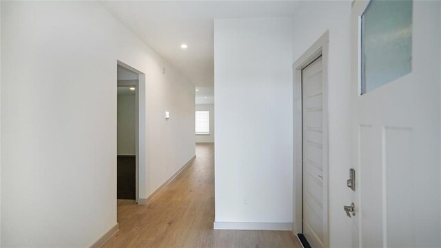 30106 Reagans Ranch Dr, Katy, TX 77494 - corridor featuring recessed lighting, light wood-style flooring, and baseboards