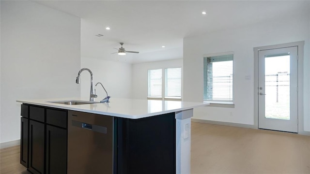 30106 Reagans Ranch Dr, Katy, TX 77494 - kitchen featuring recessed lighting, a sink, light countertops, baseboards, and stainless steel dishwasher