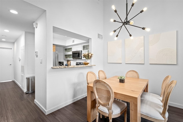 dining room with visible vents, baseboards, dark wood-style floors, a chandelier, and recessed lighting
