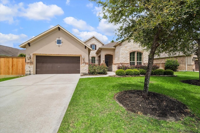 19907 Cullen Ridge Dr, Porter, TX 77365 - view of front of home with stucco siding, a front yard, an attached garage, and stone siding