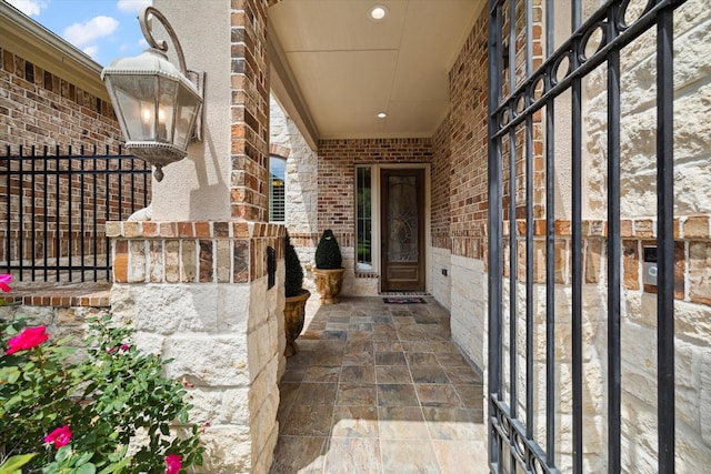 19907 Cullen Ridge Dr, Porter, TX 77365 - view of exterior entry featuring brick siding