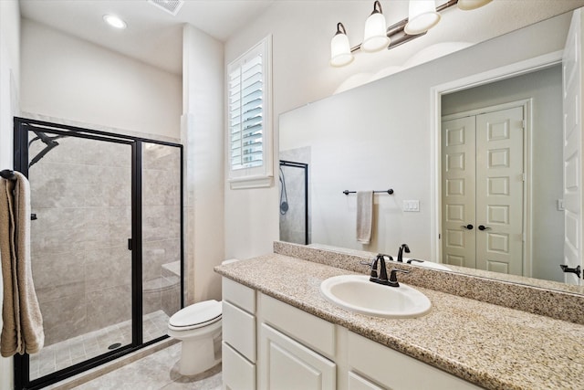 19907 Cullen Ridge Dr, Porter, TX 77365 - full bath featuring a shower stall, vanity, tile patterned floors, toilet, and visible vents