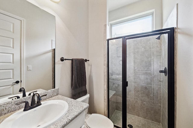 19907 Cullen Ridge Dr, Porter, TX 77365 - bathroom featuring toilet, vanity, and a shower stall