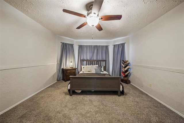 bedroom with carpet floors, a textured ceiling, and baseboards