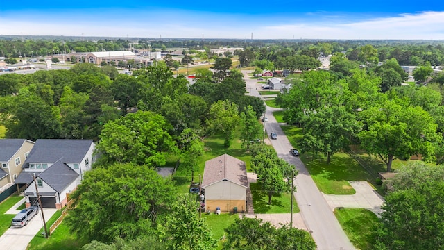 215 N Howard St, Tomball, TX 77375 - aerial view of residential area featuring a tree filled landscape