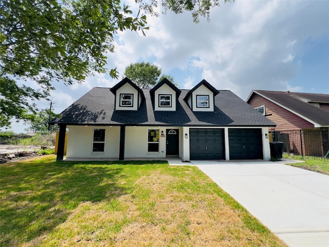 5618 Grace Point Ln, Houston, TX 77048 - new england style home with a porch, fence, a garage, roof with shingles, and a front lawn