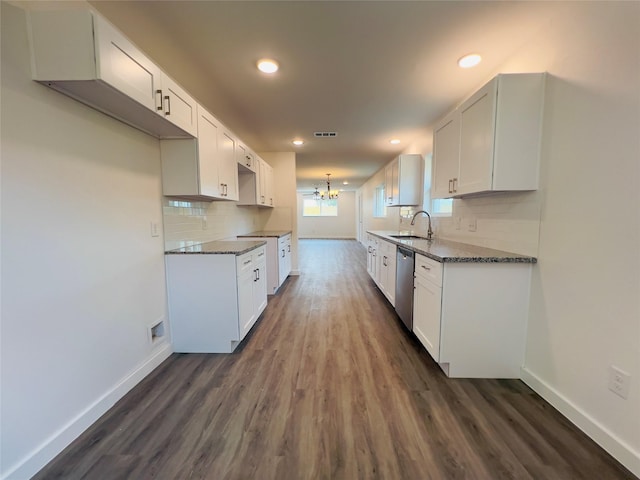 5618 Grace Point Ln, Houston, TX 77048 - kitchen with stainless steel dishwasher, recessed lighting, a sink, and baseboards