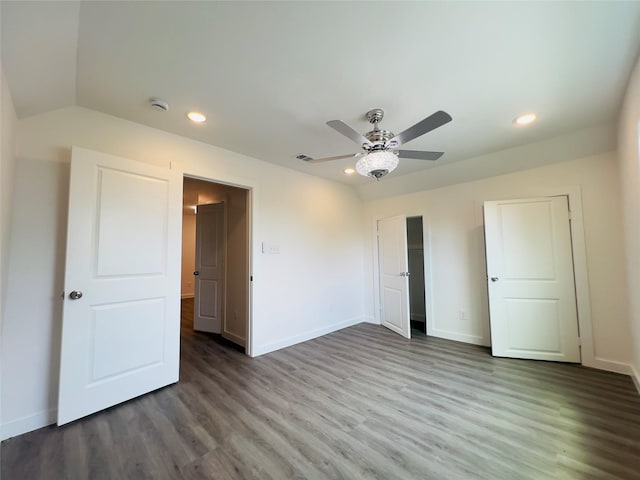 5618 Grace Point Ln, Houston, TX 77048 - unfurnished bedroom with wood finished floors, recessed lighting, visible vents, and baseboards