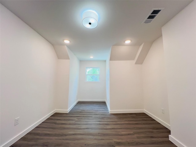 5618 Grace Point Ln, Houston, TX 77048 - bonus room featuring recessed lighting, dark wood-type flooring, baseboards, visible vents, and lofted ceiling