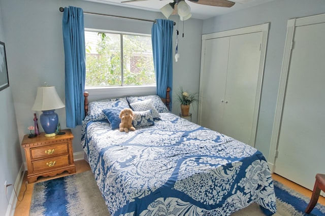 bedroom featuring a closet, a ceiling fan, and baseboards