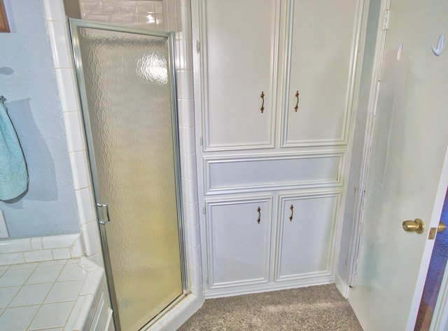 bathroom featuring a stall shower