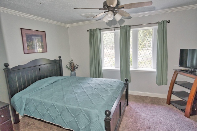 carpeted bedroom with baseboards, ornamental molding, ceiling fan, and a textured ceiling