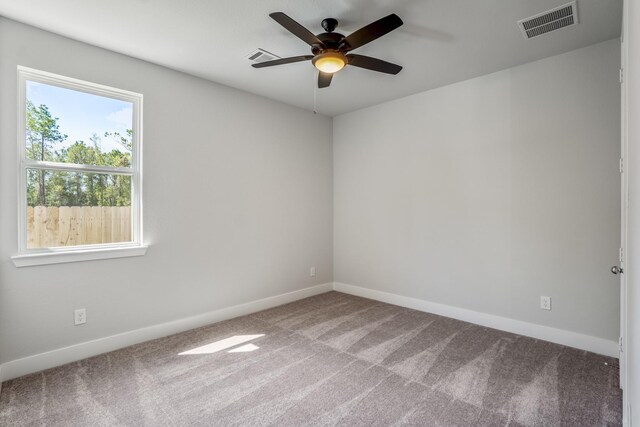 17311 Sunflower Petals Trl, Conroe, TX 77302 - carpeted empty room with visible vents, ceiling fan, and baseboards