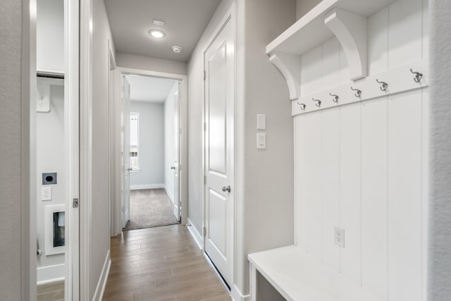 17311 Sunflower Petals Trl, Conroe, TX 77302 - mudroom featuring wood finished floors and baseboards