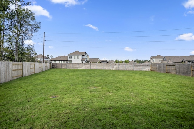 17311 Sunflower Petals Trl, Conroe, TX 77302 - view of yard with a fenced backyard