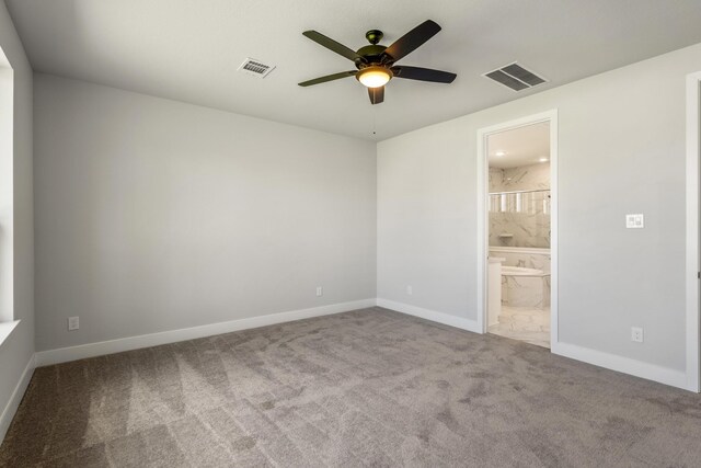 17311 Sunflower Petals Trl, Conroe, TX 77302 - unfurnished bedroom featuring carpet flooring, visible vents, and baseboards