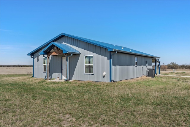 736 County Road 478, Lott, TX 76656 - view of home's exterior featuring a yard and central AC unit