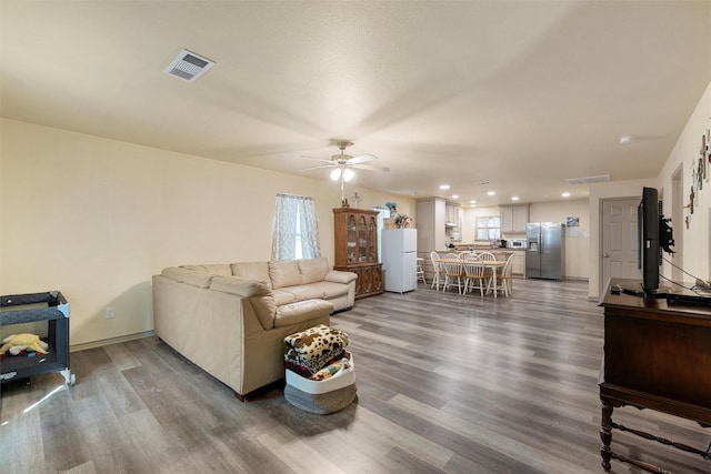 736 County Road 478, Lott, TX 76656 - living area featuring visible vents, recessed lighting, ceiling fan, and wood finished floors