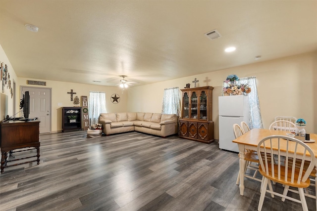 736 County Road 478, Lott, TX 76656 - living room featuring ceiling fan, wood finished floors, and visible vents