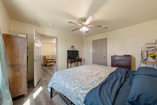 736 County Road 478, Lott, TX 76656 - bedroom with ceiling fan, visible vents, and light wood-type flooring