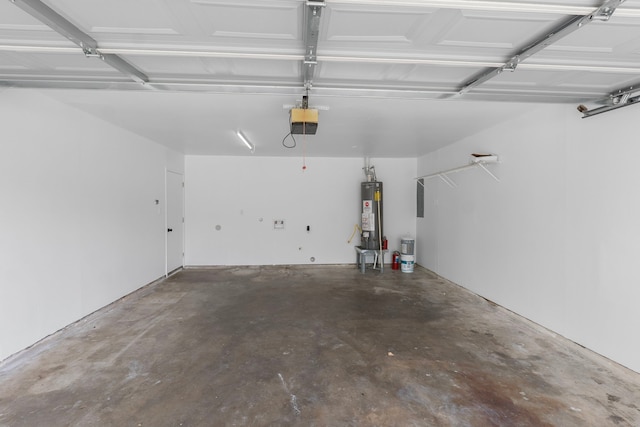 garage featuring water heater and a garage door opener