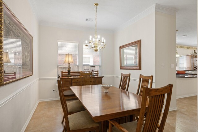dining space featuring visible vents, crown molding, an inviting chandelier, baseboards, and light tile patterned floors