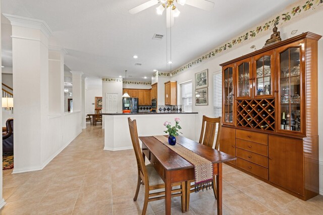 dining area with light tile patterned flooring, ceiling fan, recessed lighting, ornate columns, and visible vents