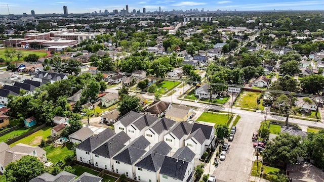 aerial view featuring a city view and a residential view