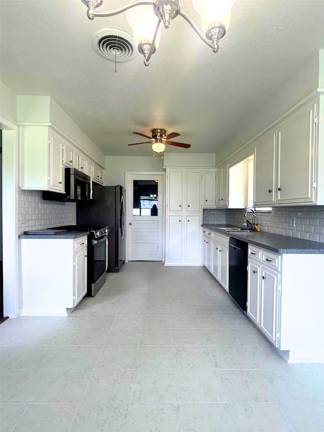 kitchen with a sink, decorative backsplash, black appliances, a ceiling fan, and dark countertops