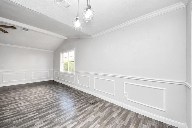 15030 Royal Shadows Dr, Houston, TX 77082 - empty room with dark wood finished floors, wainscoting, vaulted ceiling, ceiling fan, and visible vents