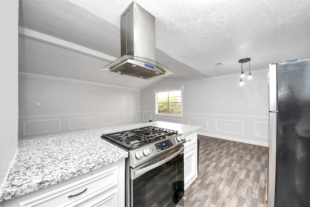 15030 Royal Shadows Dr, Houston, TX 77082 - kitchen featuring crown molding, island range hood, stainless steel appliances, light stone countertops, and wood finished floors