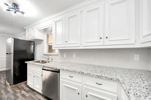 15030 Royal Shadows Dr, Houston, TX 77082 - kitchen with a sink, dark wood-style flooring, stainless steel appliances, and white cabinetry