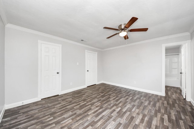 15030 Royal Shadows Dr, Houston, TX 77082 - spare room featuring crown molding, a ceiling fan, dark wood-style flooring, and baseboards