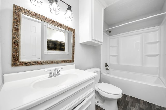 15030 Royal Shadows Dr, Houston, TX 77082 - full bath featuring shower / bathing tub combination, wood finished floors, toilet, and vanity
