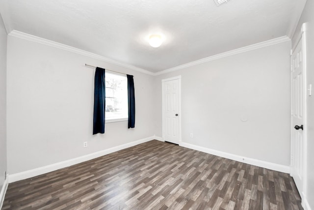 15030 Royal Shadows Dr, Houston, TX 77082 - unfurnished room featuring dark wood-style flooring and crown molding
