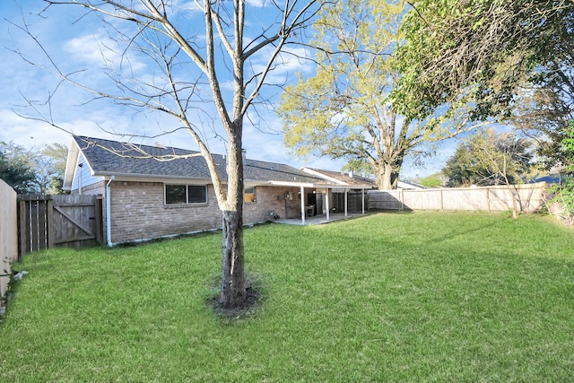 15030 Royal Shadows Dr, Houston, TX 77082 - view of yard featuring a gate, a fenced backyard, and a patio area