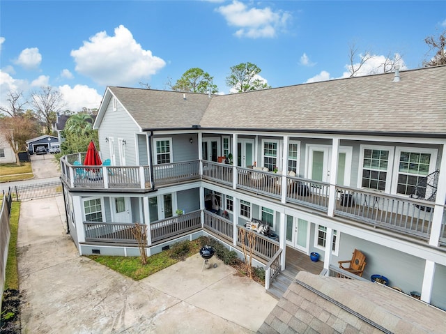 3327 Palm St, Houston, TX 77004 - back of house with french doors, roof with shingles, and a patio area
