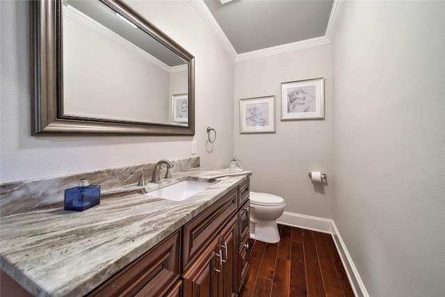 3327 Palm St, Houston, TX 77004 - bathroom with baseboards, wood finished floors, ornamental molding, toilet, and vanity
