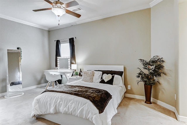 carpeted bedroom with visible vents, a ceiling fan, ornamental molding, and baseboards