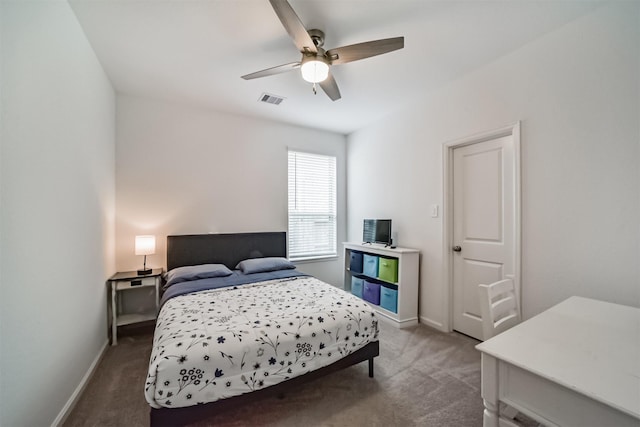 bedroom with baseboards, visible vents, a ceiling fan, and carpet flooring