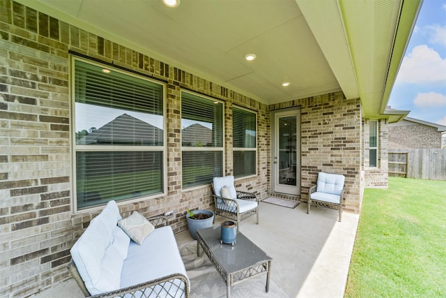 view of patio featuring fence