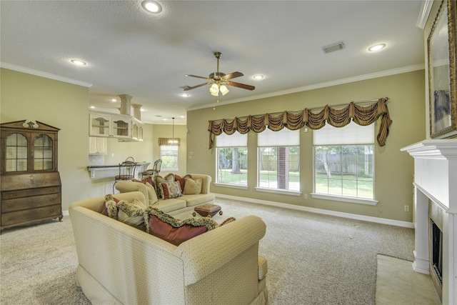 living room with a fireplace with flush hearth, visible vents, ceiling fan, and light carpet