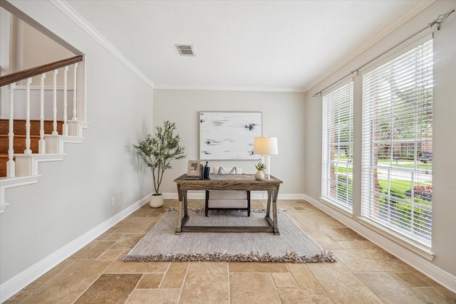 office space with crown molding, baseboards, visible vents, and stone tile flooring
