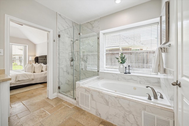 ensuite bathroom with visible vents, connected bathroom, a marble finish shower, and a garden tub
