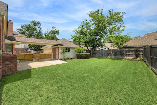 view of yard featuring a fenced backyard and a patio